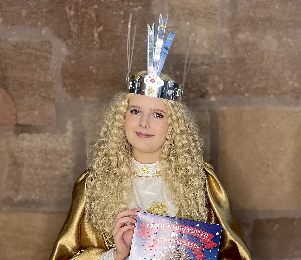 Christkind mit Adventskalender